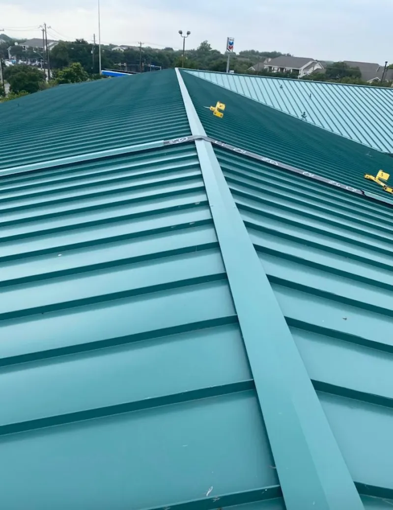 Green commercial metal roof ridge and valley for Metal Roof Repair in North Londonderry